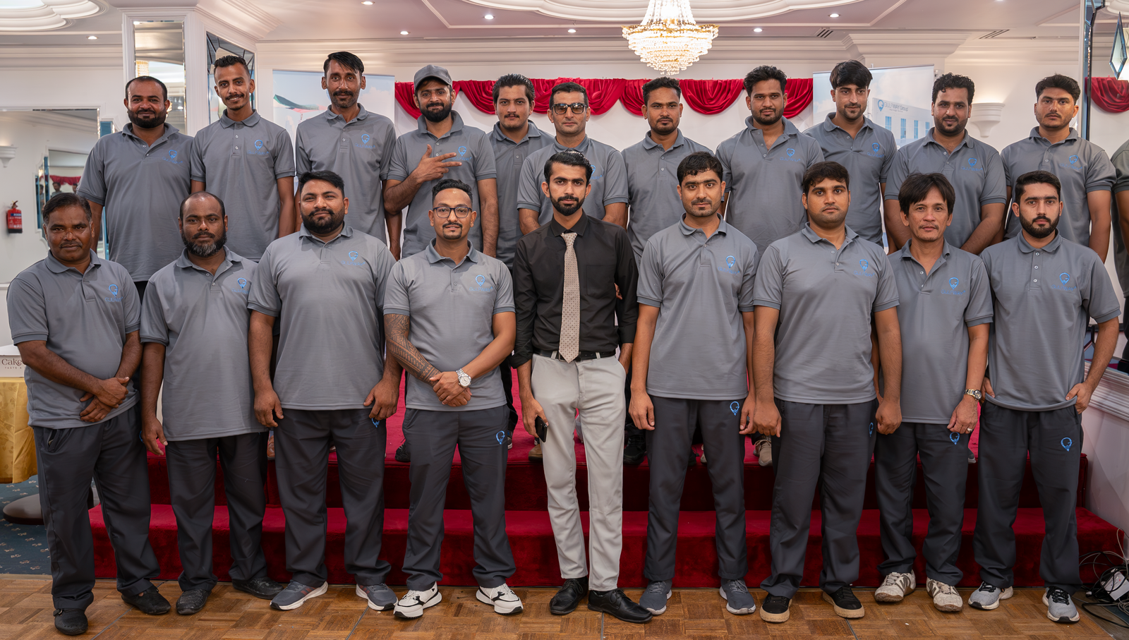 Gulf Way Auto mechanics team with supervisor at Gulf Way Group annual party, representing unity and professionalism
